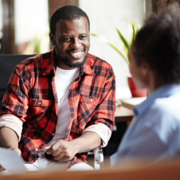 a man smiling in a job interview